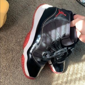 Jordan 11 retro “playoffs” bred